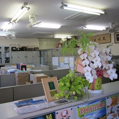 佐藤産業(株)